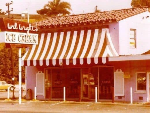 Vintage Wil Wright’s ice cream shop with striped awning.